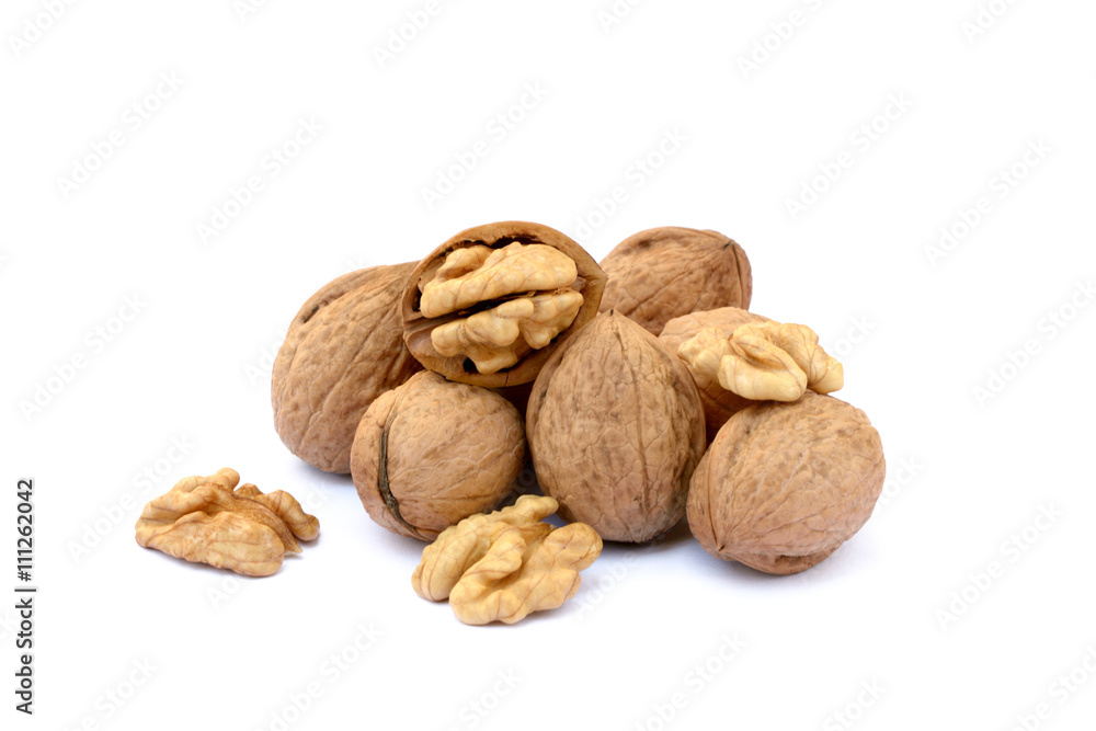 Pile of walnuts isolated on white background Pile of walnuts isolated on white background