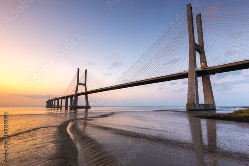 Vasco da Gama bridge, sunrise at Lisboa