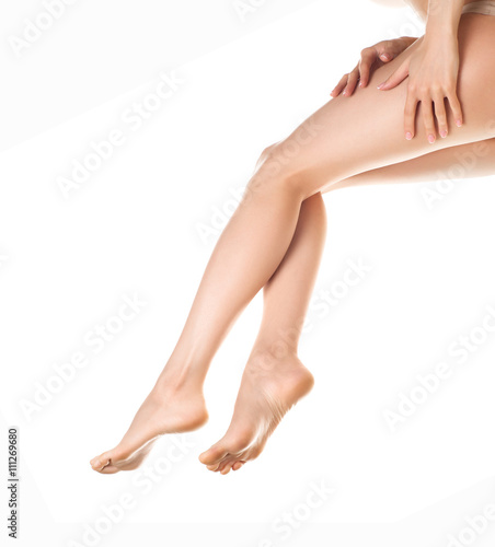 woman legs isolated on white. Depilation or another healths concept © Glebstock