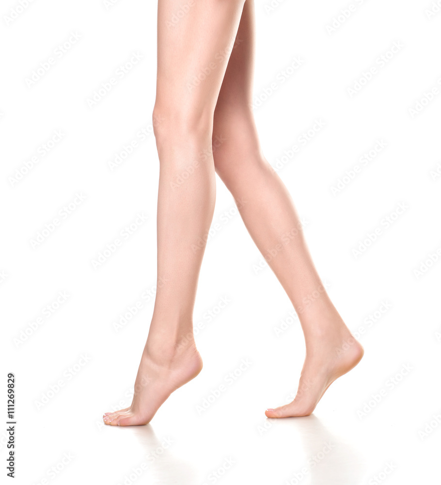woman legs isolated on white. Depilation or another healths concept woman legs isolated on white. Depilation or another healths concept