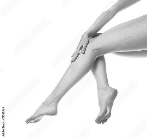 woman legs isolated on white. Depilation or another healths concept