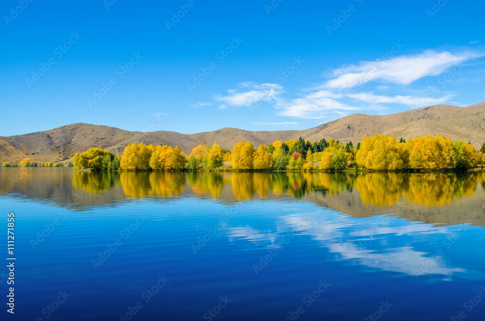 Autumn reflections at Wairepo Arm, Lake Ruataniwha in New Zealand.