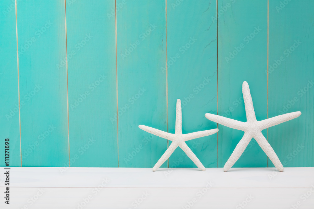 Starfish on a blue wooden background Starfish on a blue wooden background