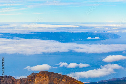 La Gomera island behind the clouds in Tenerife, Spain