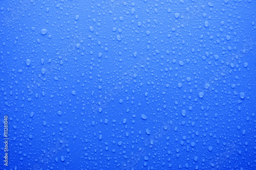 water drop on deep blue surface