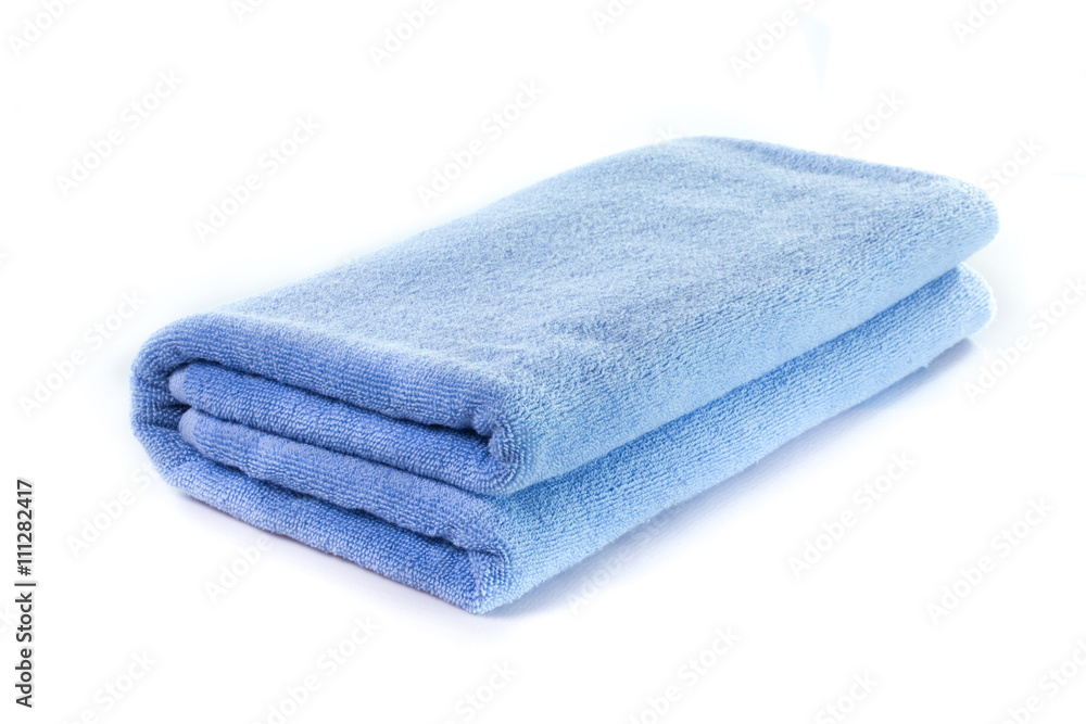 Light Blue soft bath towel isolated on white background Light Blue soft bath towel isolated on white background