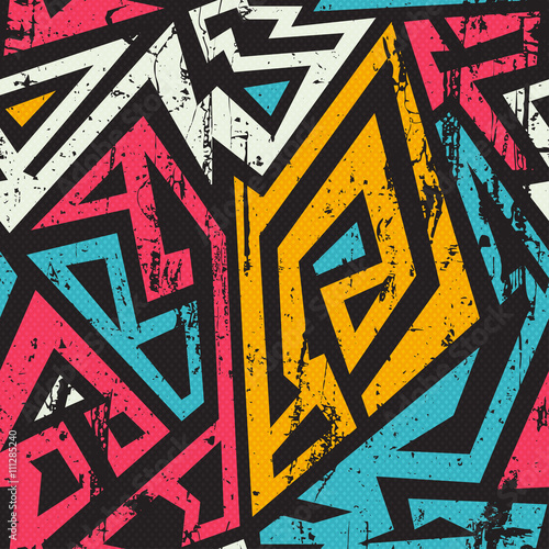 African geometric seamless with grunge effect.