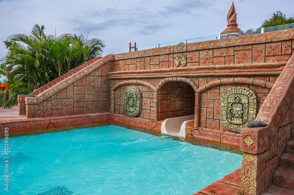 Swimming pool with asian architecture in auqa park in Tenerife, Spain