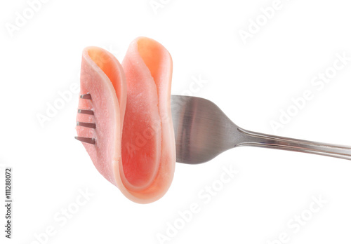 thin slice of ham on a fork