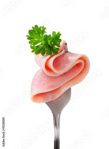 slice of ham on a fork