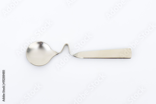 bent metal spoon photo