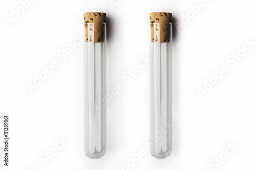 Two empty glass transparent test tube closed with cork on white background