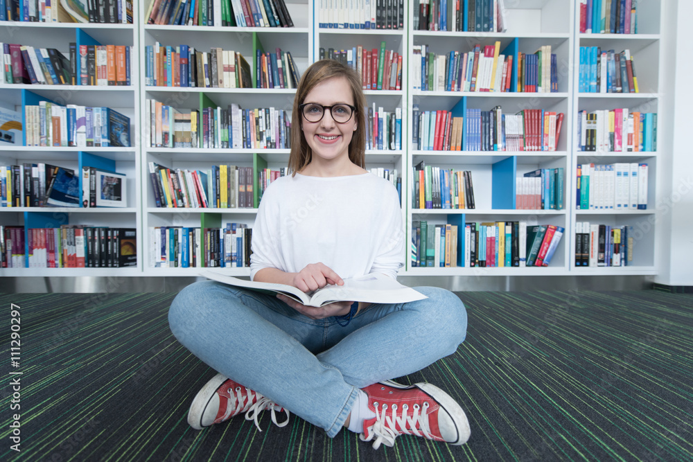 female student study in library, using tablet and searching for female student study in library, using tablet and searching for
