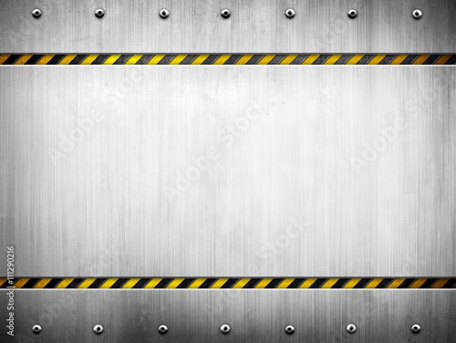 metal template with warning striped background