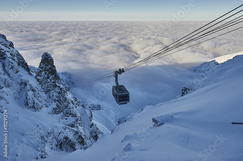 Chair lift on Kasprowy Wierch with Gasienicowa valley in the distance, nature photo