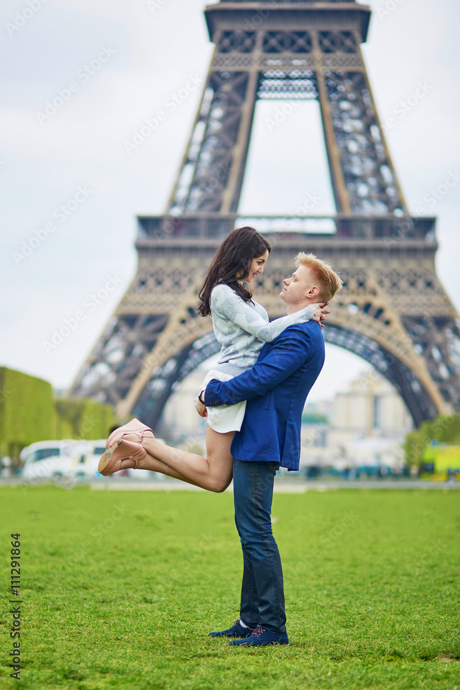 Romantic couple in Paris near the Eiffel tower