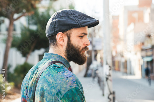 Portrait of hipster man on the street photo