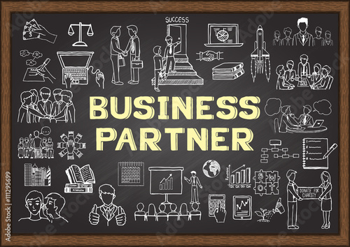 Hand drawn icons about BUSINESS PARTNER on chalkboard