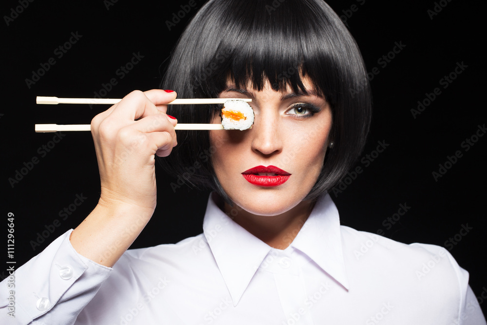 Sexy woman in wig holding sushi Sexy woman in wig holding sushi