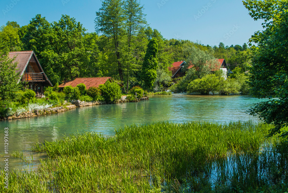 Obraz premium Beautiful village of Rastoke near Slunj in Croatia, river Slunjcica, old water mills and cottages