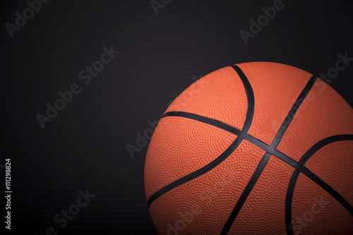 Basketball ball isolated on black background © cristovao31
