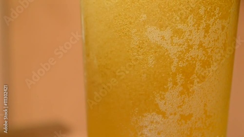 intoxicating beer in a glass

