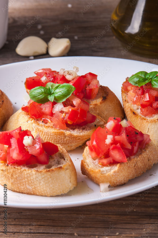 Bruschetta with tomato, onion and basil Bruschetta with tomato, onion and basil