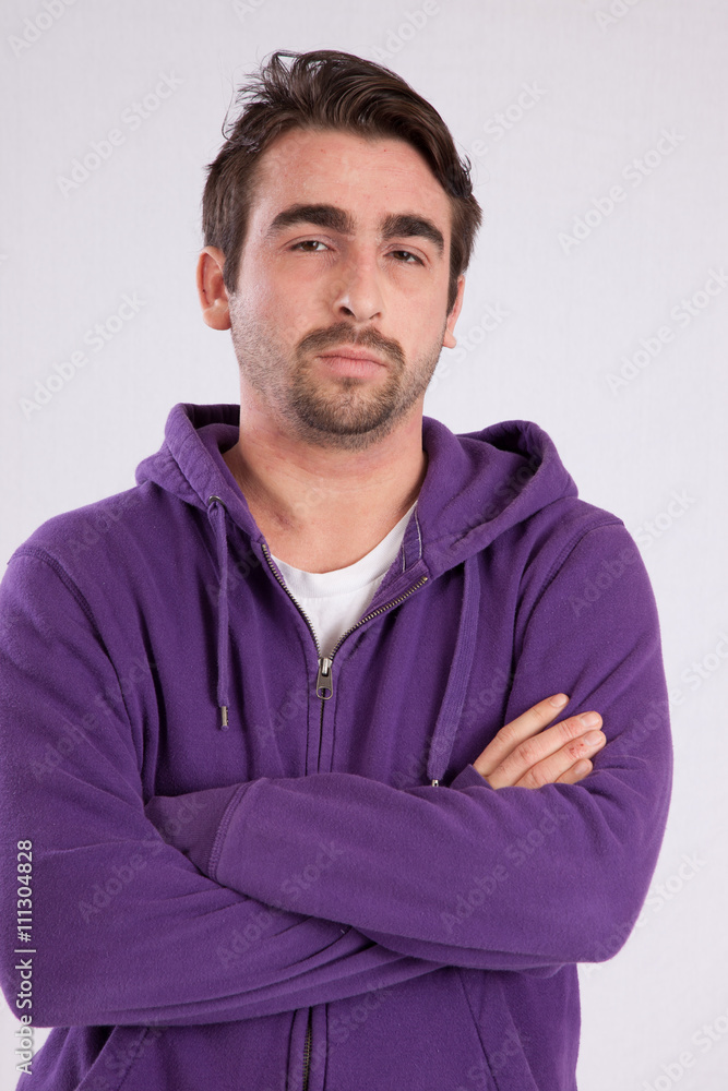 Man with arms crossed looking thoughtful Man with arms crossed looking thoughtful