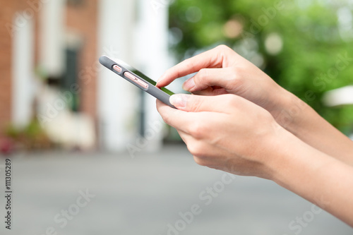 Woman hold with mobile phone