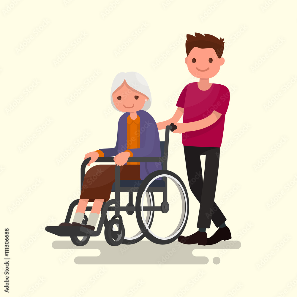 Social worker on a walk with disabled grandmother in a wheelchair Social worker on a walk with disabled grandmother in a wheelchair
