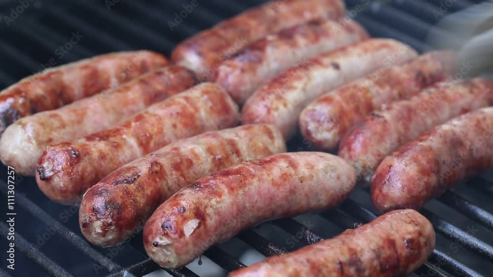 Bratwurst sausages on grill Bratwurst sausages on grill