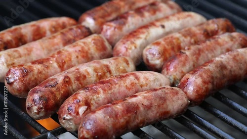Bratwurst sausages on grill