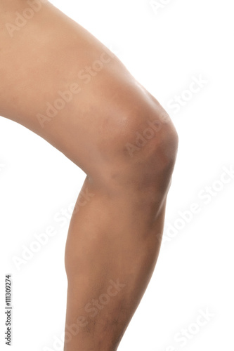 man's knee bending on a white background