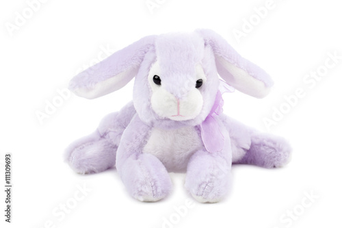 purple stuffed toy rabbit lying on the floor