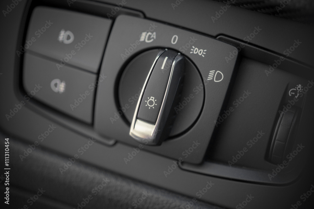 Headlights button in a car Headlights button in a car