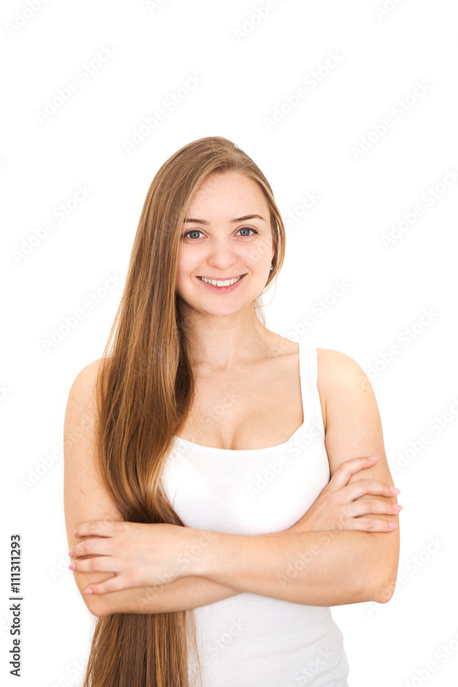 Portrait of happy young woman with long hair and folded hand. Over white background .
Portrait of happy young woman with long hair and folded hand. Over white background .