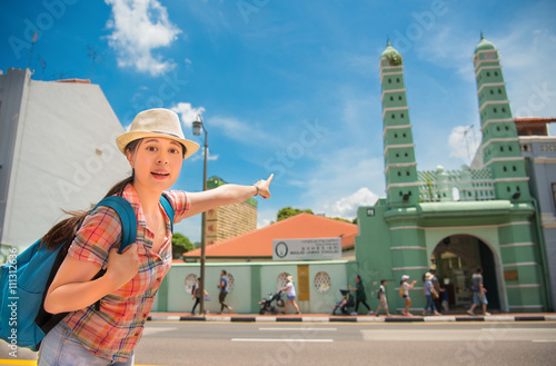 Happy Asia woman Travel in Singapore,Masjid Jamae photo