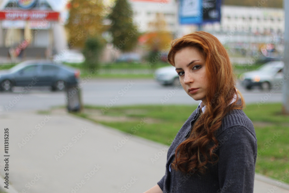 red-haired girl in autumn jacket