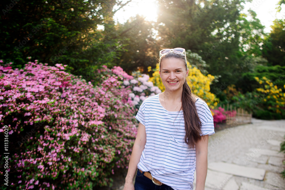 Fototapeta premium Young woman in the park