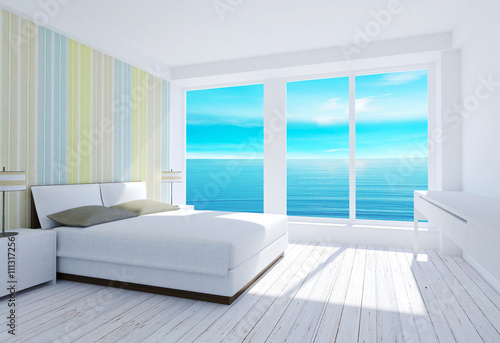 White modern loft bedroom interior with sea view