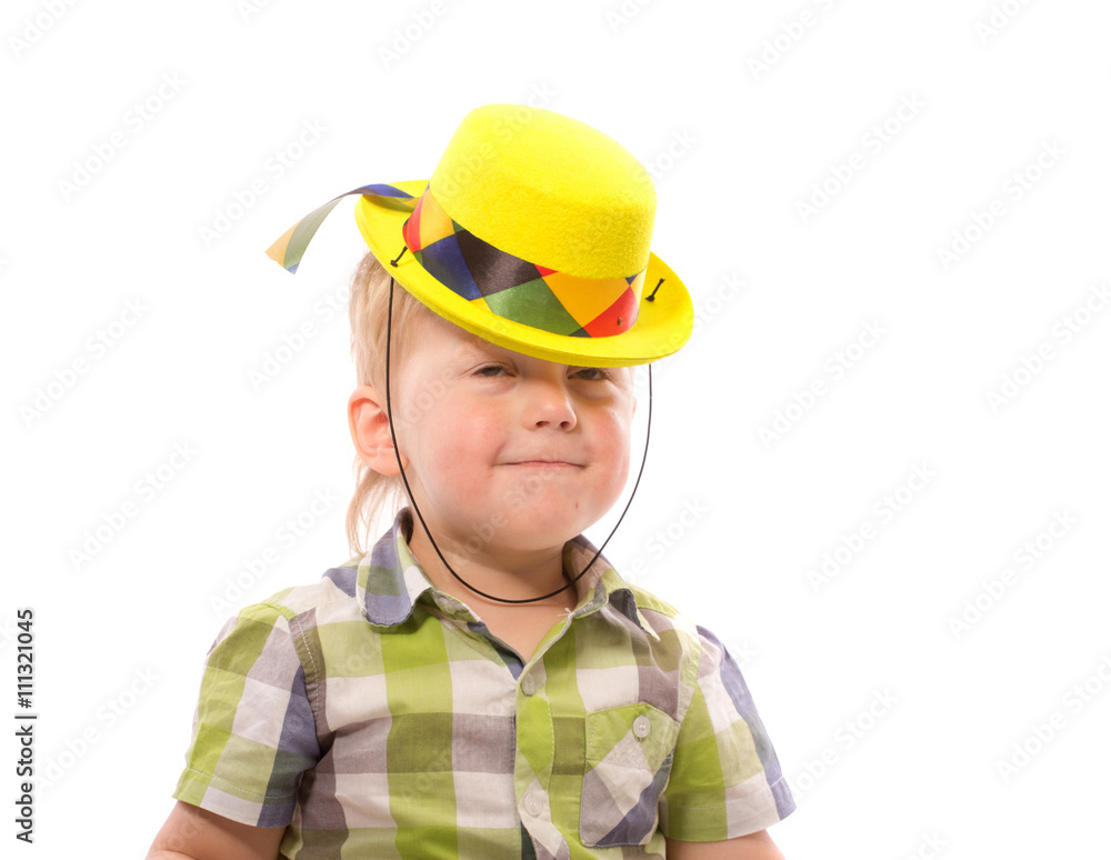 Little Funny boy in shirt and funny hat.