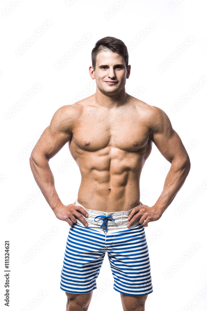 Sexy athletic man showing muscular body and sixpack abs, isolated over white background. Strong male nacked torso Sexy athletic man showing muscular body and sixpack abs, isolated over white background. Strong male nacked torso