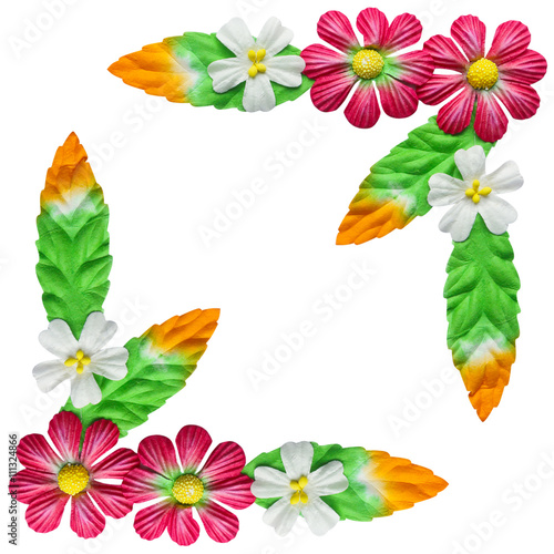 Flowers made of colorful paper used for decoration isolated on