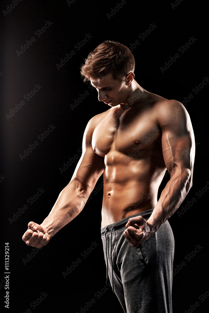 Naklejka premium Image of very muscular man posing with naked torso