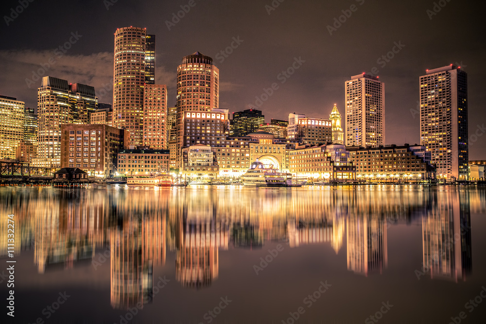 Beautiful night view of Boston Massachusetts skyline and Boston Harbor 