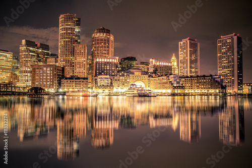 Beautiful night view of Boston Massachusetts skyline and Boston Harbor  © littleny