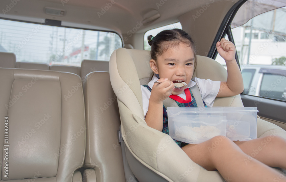 children in car Eating Breakfast before school children in car Eating Breakfast before school