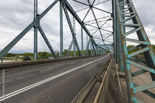 Fototapeta Naklejka Na Ścianę i Meble -  Torun famous truss bridge over Vistula river. Transportation infrastructure.