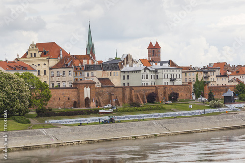 Torun in Poland, Old Town skyline, fortified medieval city, river view.