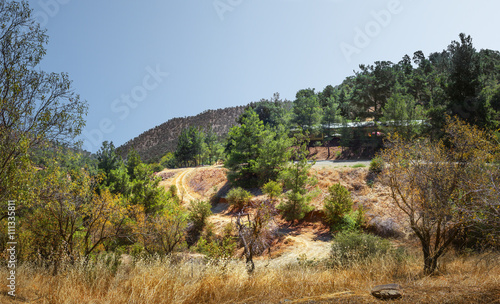 Scenic view of the courtyard from the church of Panagia tis Asinou. The village Nikitari. Cyprus